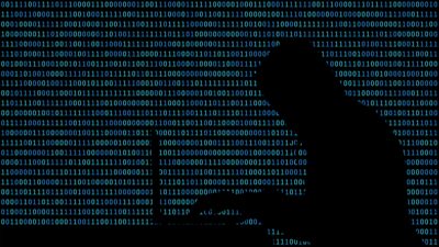 Silhouette of a hacker in front of a digital stream of blue binary code.